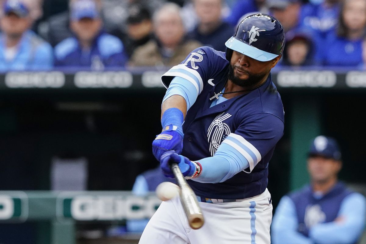 Carlos Santana #41 of the Kansas City Royals connects with a New York Yankees pitch during the first inning at Kauffman Stadium on April 30, 2022 in Kansas City, Missouri.