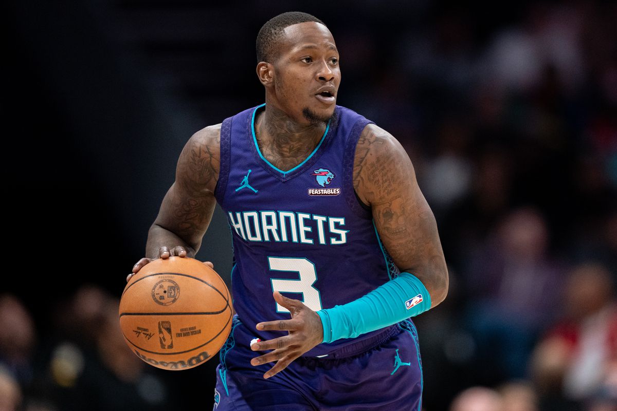 Terry Rozier of the Charlotte Hornets brings the ball up court against the Philadelphia 76ers during their game at Spectrum Center on January 20, 2024 in Charlotte, North Carolina.