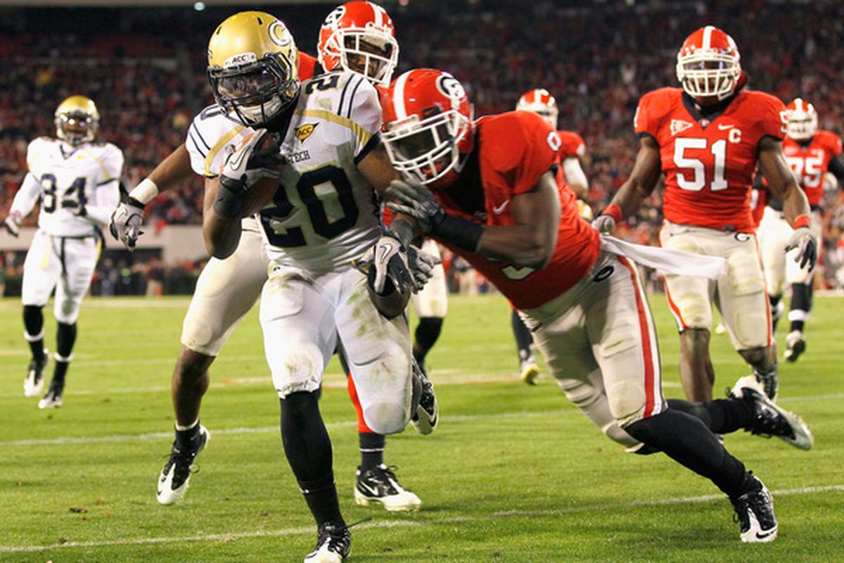 ATHENS GA - NOVEMBER 27:  Roddy Jones #20 of the Georgia Tech Yellow Jackets rushes in for a touchdown against Alec Ogletree #9 of the Georgia Bulldogs at Sanford Stadium on November 27 2010 in Athens Georgia.  (Photo by Kevin C. Cox/Getty Images)