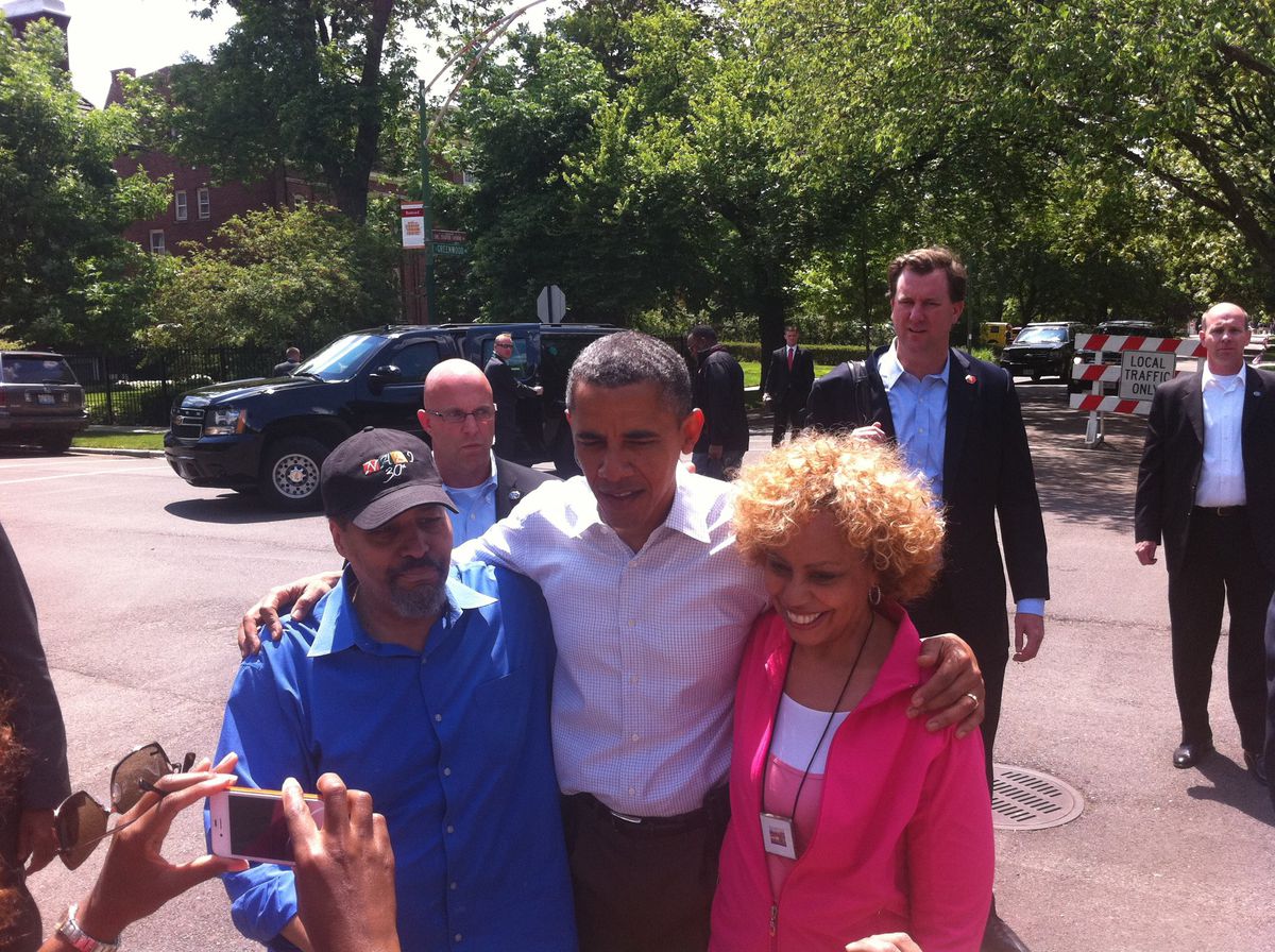 Ken Smikle and wife Renee Ferguson with their Kenwood neighbor, former President Barack Obama, who lives two blocks down. | Provided photo