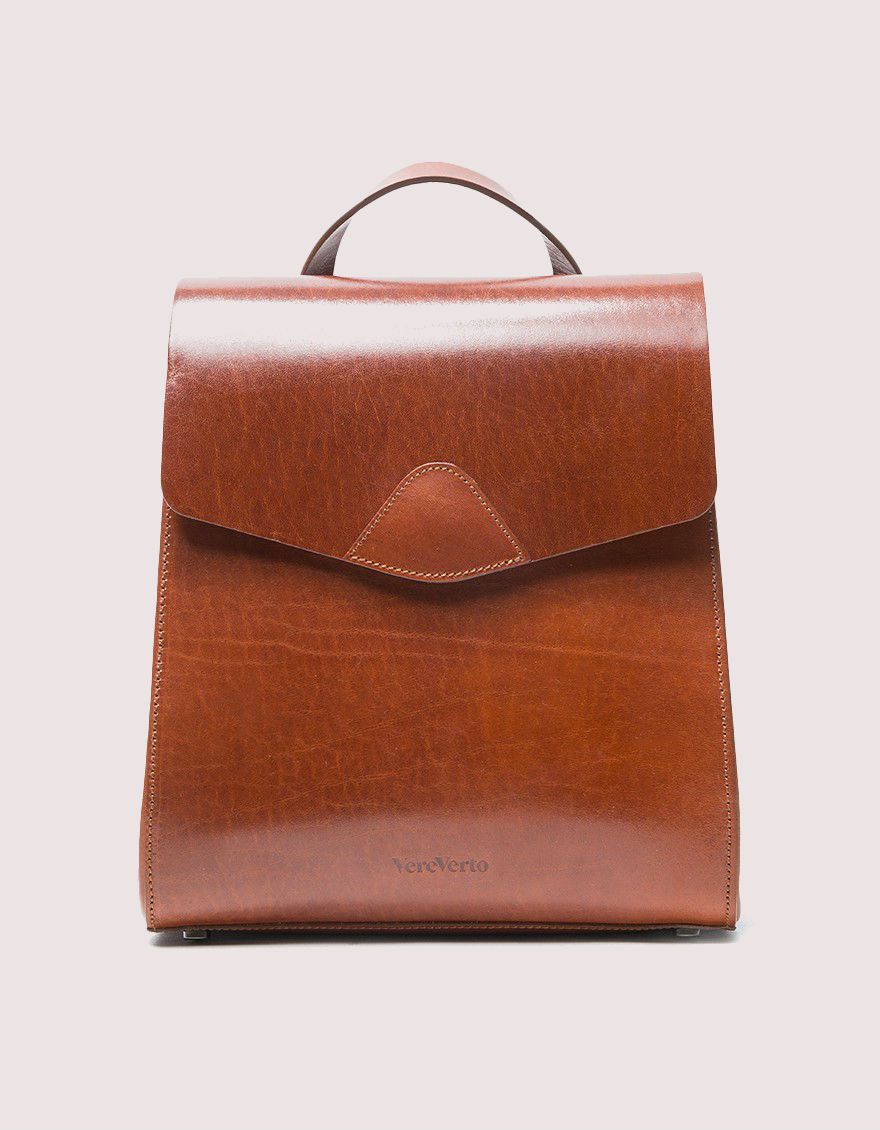 Chestnut brown top handle flat backpack. 