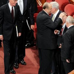 LDS Church President Thomas S. Monson pats the head of Elder Joseph B. Wirthlin of the Quorum of the Twelve after the Saturday afternoon session of the 178th Semiannual General Conference of The Church of Jesus Christ of Latter-say Saints, Oct. 4, 2008.