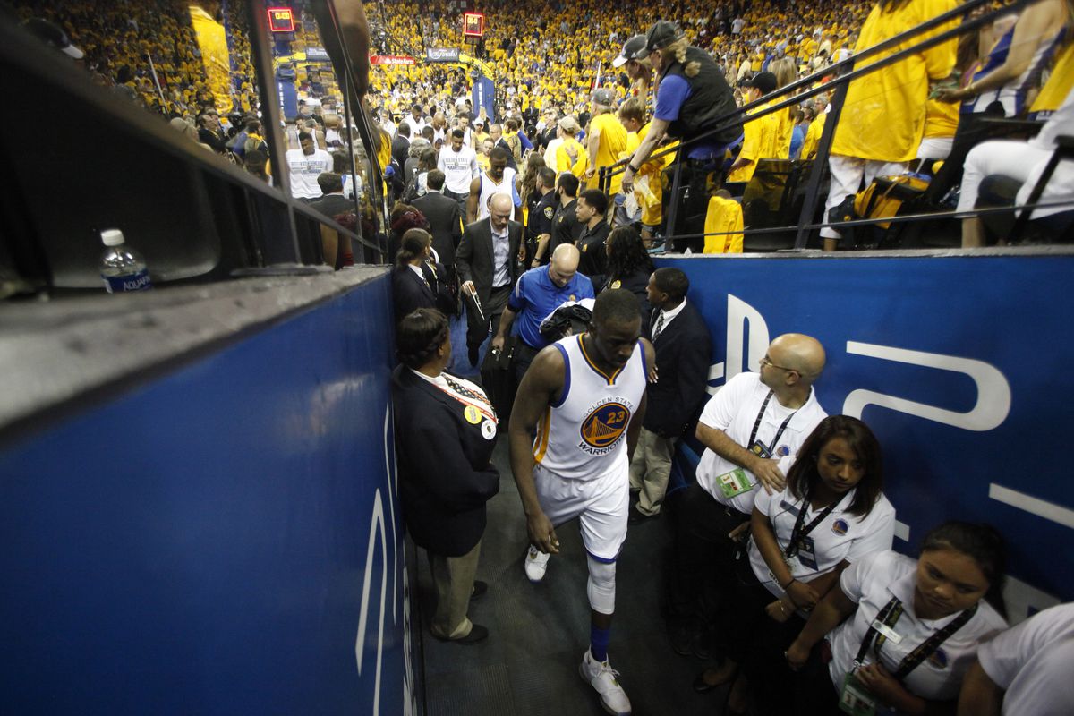 Golden State Warriors’ Draymond Green (23) and his team leave the court after the Cleveland Cavaliers won Game 7 93-89 for the NBA Finals at Oracle Arena in Oakland, Calif., on Sunday, June 19, 2016. (Nhat V. Meyer/Bay Area News Group)