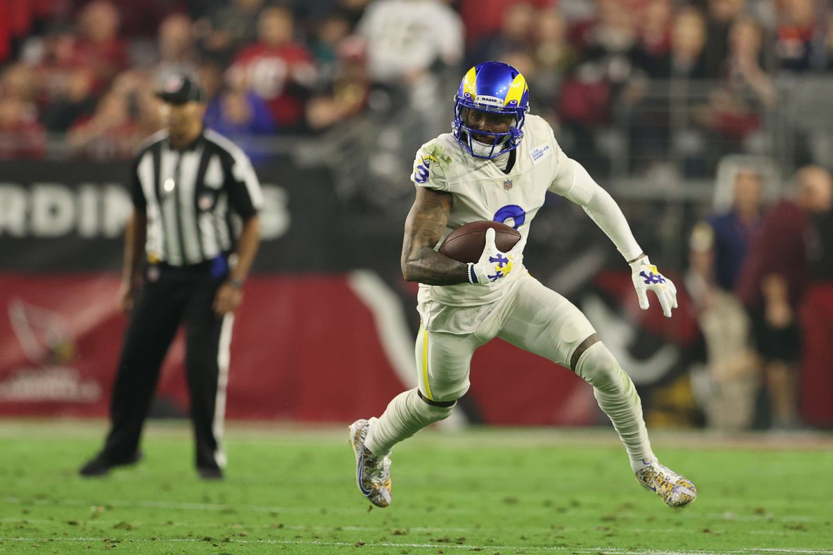 Wide receiver Odell Beckham Jr. #3 of the Los Angeles Rams runs with the football after a reception against the Arizona Cardinals during the NFL game at State Farm Stadium on December 13, 2021 in Glendale, Arizona. The Rams defeated the Cardinals 30-23.