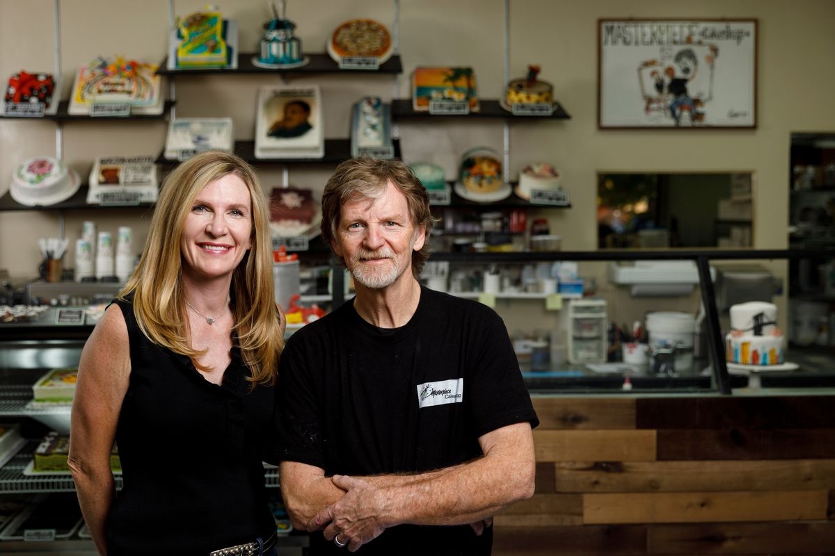 FILE - Jack Phillips, owner of Masterpiece Cakeshop in Lakewood, CO poses for a portrait with Alliance Defending Freedom attorney Nicolle Martin on Sept. 21, 2017