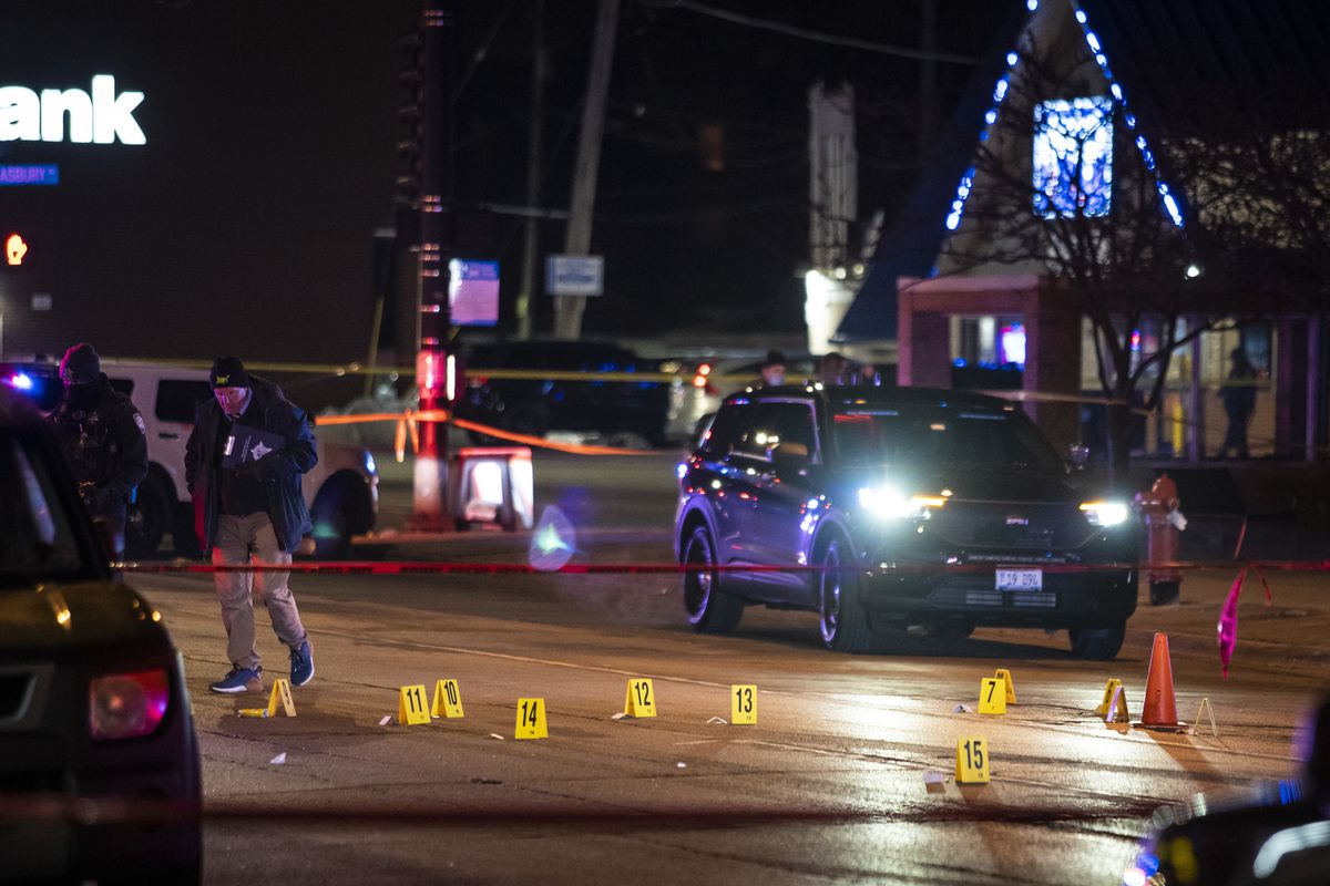 Police investigate a shooting inside an IHOP restaurant Saturday night in Evanston that left a woman critically wounded. The gunman was later killed by officers during a gun battle in a nearby parking lot.