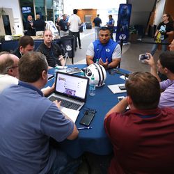 BYU head football coach Kalani Sitake talks with reporters during a breakout session is during the BYU football media day in Provo on Friday, June 22, 2018.
