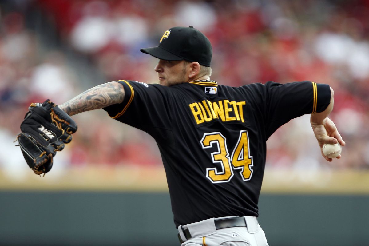 Aug 5, 2012; Cincinnati, OH, USA; Pittsburgh Pirates starting pitcher A.J. Burnett (34) pitches during the first inning against the Cincinnati Reds at Great American Ball Park. Mandatory Credit: Frank Victores-US PRESSWIRE