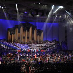 The cast gathers on the stage at the end of a Christmas concert at the Conference Center of The Church of Jesus Christ of Latter-day Saints in Salt Lake City, Thursday, Dec. 12, 2013.
