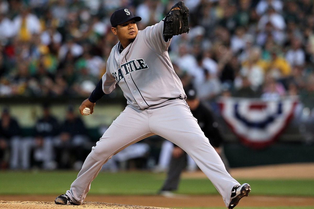 OAKLAND, CA - APRIL 01:  Felix Hernandez #34 of the Seattle Mariners pitches against the Oakland Athletics during the first inning at the Oakland-Alameda County Coliseum on April 1, 2011 in Oakland, California  (Photo by Justin Sullivan/Getty Images)