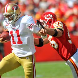 Sep 26, 2010; Kansas City, MO, USA; San Francisco 49ers quarterback Alex Smith (11) is hit by Kansas City Chiefs linebacker Andy Studebaker (96) in the second half at Arrowhead Stadium. The Chiefs won 31-10. 