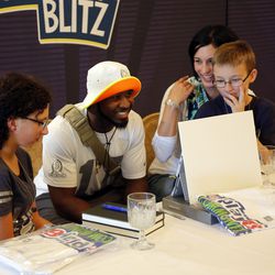 NFL Pro Bowler Devin Hester joins a video chat session with an airman deployed overseas and their family back home during the Airman for a Day event at Luke Air Force Base sponsored by USAA, the Official Military Appreciation Sponsor of the NFL, on Wednes