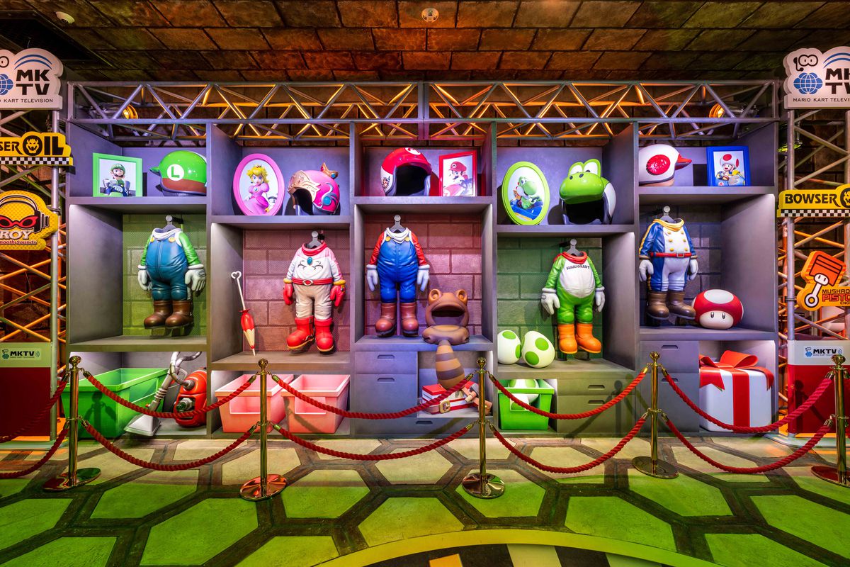 Various Mario Kart outfits for Mario, Luigi, Peach, Yoshi, and Toad in the waiting area for Mario Kart: Bowser’s Challenge in Super Nintendo World at Universal Studios Hollywood.