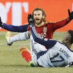 Real's Kyle Beckerman tries to get a foul called on Kansas City's C.J. Sapong as Real Salt Lake and Sporting KC play Saturday, Dec. 7, 2013 in MLS Cup action. Sporting KC won in a shootout.