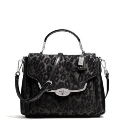 <a href="http://f.curbed.cc/f/Coach_111913_Satchel">Madison Small Sadie Flap Satchel in Chenille Ocelot</a>, $278