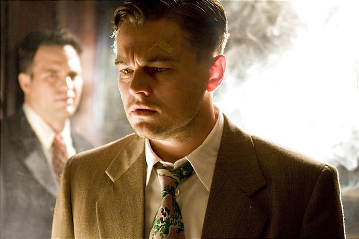 Chuck Aule (Mark Ruffalo, left) and Teddy Daniels (Leonardo DiCaprio, right) are two detectives sent from the mainland to investigate a mysterious disappearance on an island prison for the criminally insane in the thriller "Shutter Island."