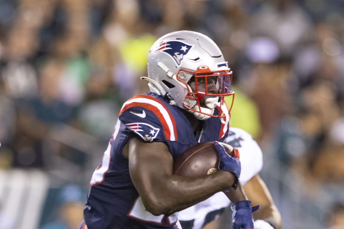 Sony Michel #26 of the New England Patriots runs the ball against the Philadelphia Eagles in the preseason game at Lincoln Financial Field on August 19, 2021 in Philadelphia, Pennsylvania.