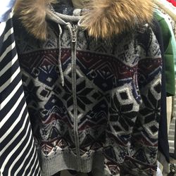 Sample zip-up with furry-trimmed hood, $168.38 (was $449)