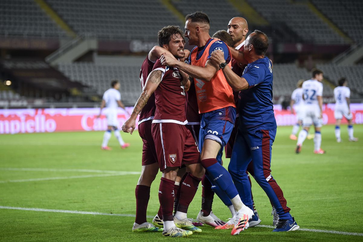 Andrea Belotti of Torino FC celebrates with his teammates...