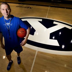 BYU men’s basketball coach Mark Pope poses in the Marriott Center in Provo on Thursday, May 23, 2019.