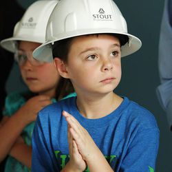 Future student Dallin Schmutz looks over things as Spectrum Academy, a charter school for students with high-functioning autism, gives a tour of the construction in Pleasant Grove Wednesday, July 9, 2014. The new Pleasant Grove school will serve kindergarten through eighth grades the first year, about 400 students, and continue to add grades until it serves 600 students in K-12.