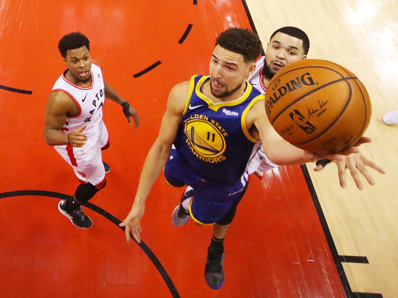 The Warriors’ Klay Thompson attempts a shot against the Raptors’ Fred VanVleet during Game 2 of the NBA Finals on Sunday in Toronto.