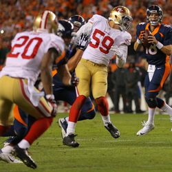 Peyton Manning looks to throw the 509th touchdown vs. the 49ers on October 19, 2014.