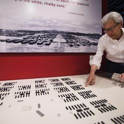 Hisashi Sugaya points out where his family lived at the Topaz Internment Camp on the opening weekend of the new Topaz Museum in Delta on Friday, July 7, 2017. The Sugaya home was number 40-10A based on the grid system inside the camp.