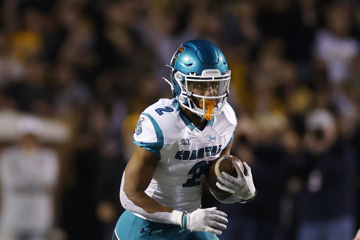 Coastal Carolina Chanticleers running back Reese White runs with the ball during a college football game against the Appalachian State Mountaineers on Oct. 20, 2021 at Kidd Brewer Stadium in Boone, North Carolina.