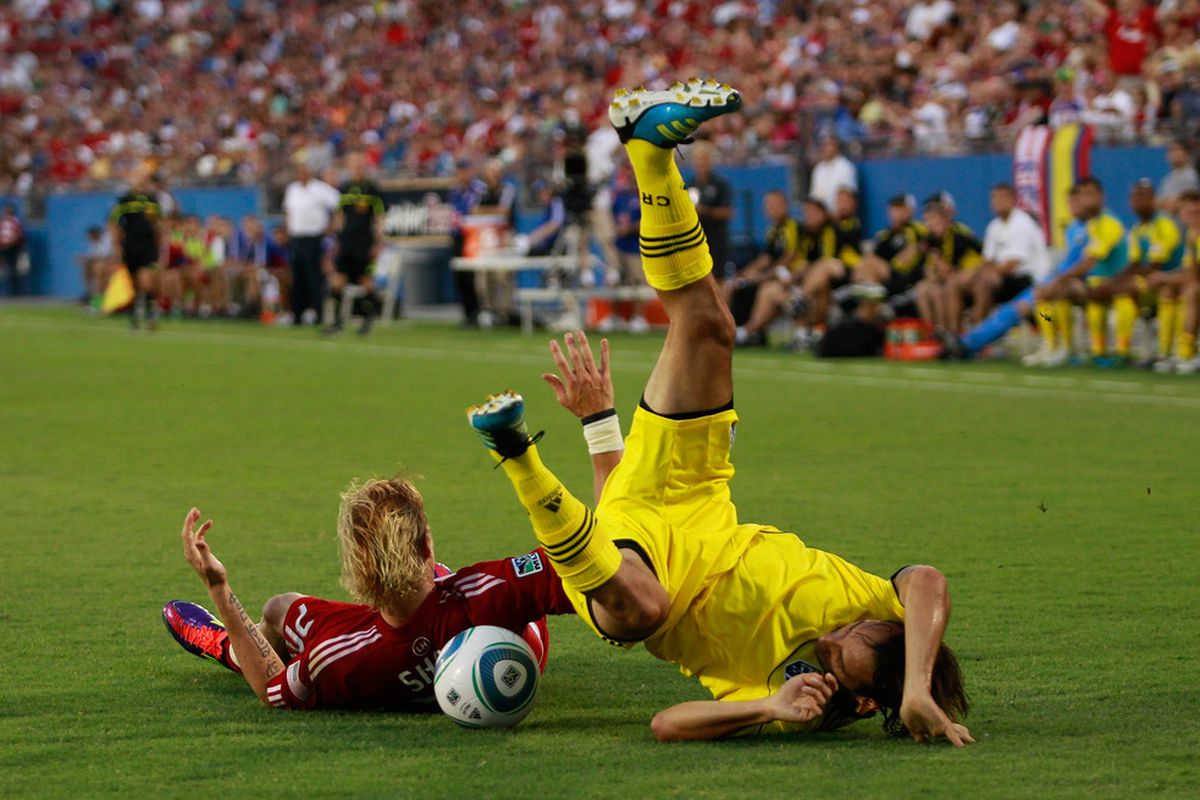 FRISCO, TX - JULY 02:  Brek Shea #20 of FC Dallas collides with Sebastian Miranda #21 of the Columbus Crew at Pizza Hut Park on July 2, 2011 in Frisco, Texas. FC Dallas beat the Columbus Crew 2-0. (Photo by Tom Pennington/Getty Images)