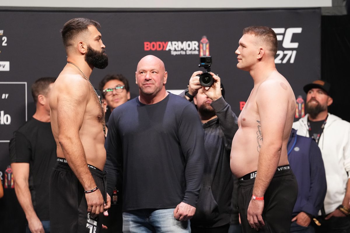 Andrei Arlovski of Belarus and Jared Vanderaa face off during the UFC 271 ceremonial weigh-in at Toyota Center on February 11, 2022 in Houston, Texas.