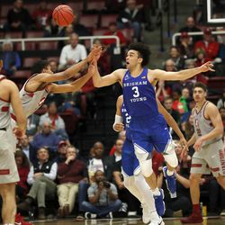 BYU guard Elijah Bryant (3) steals the ball from Stanford forward Oscar da Silva (13) during the second half of an NCAA college basketball game in the first round of the NIT, Wednesday, March 14, 2018, in Stanford, Calif. (AP Photo/Tony Avelar)