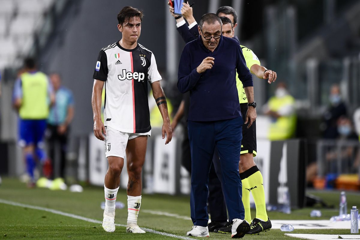 Paulo Dybala of Juventus FC leaves the pitch after an injury...
