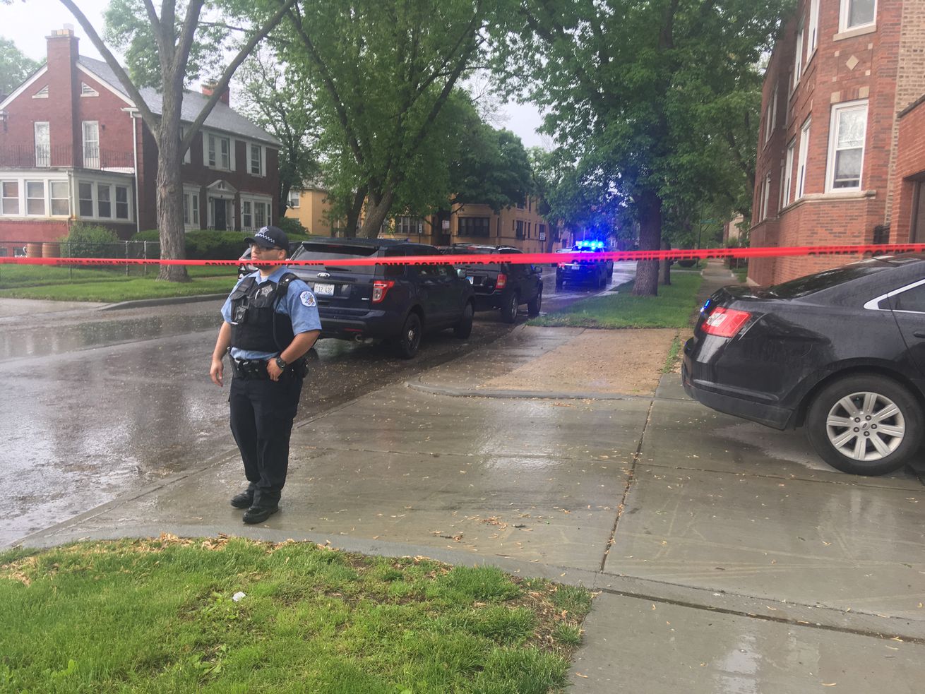 Police investigate after a man was critically wounded by Chicago police officers May 28 in the 8100 block of South Chappel Avenue.