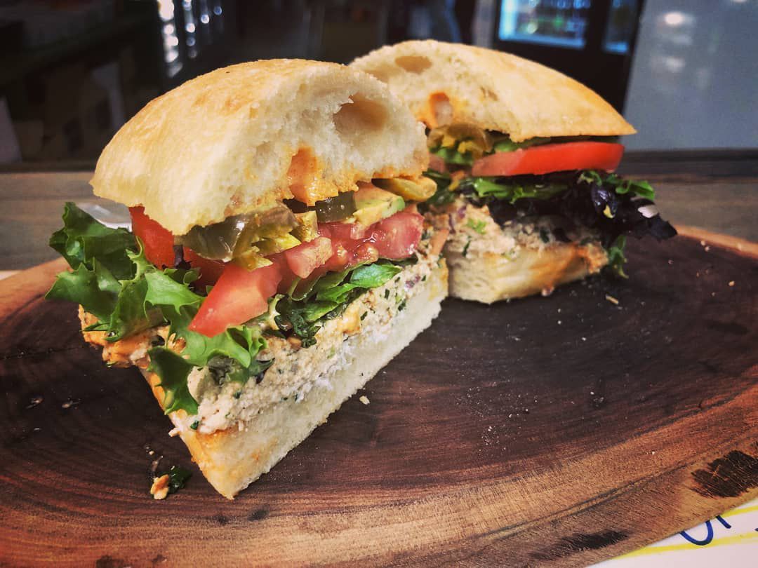 A tuna sandwich on ciabatta bread. 