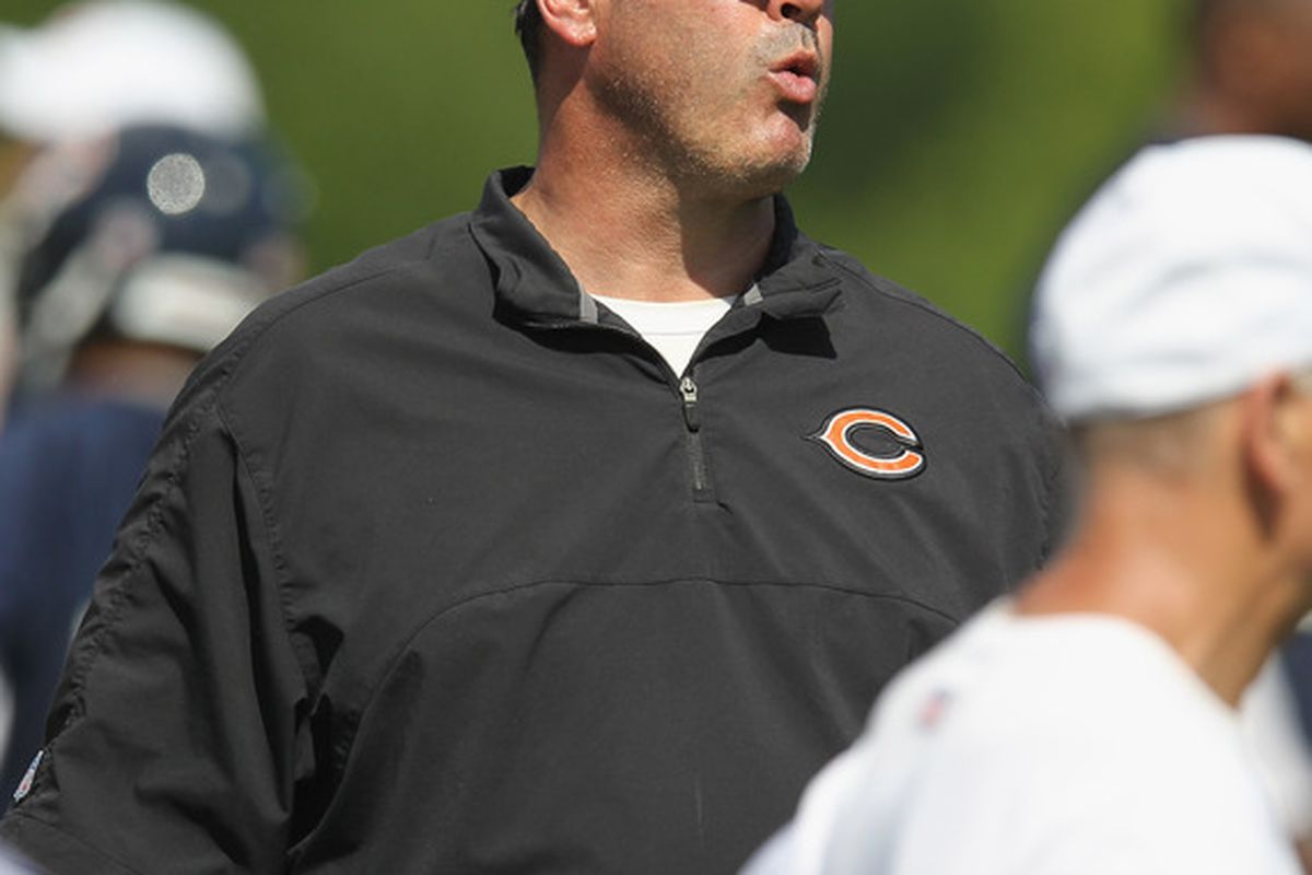 LAKE FOREST, IL - JUNE 12: Offensive coordinator Mike Tice of the Chicago Bears watches a minicamp practice at Halas Hall on June 12, 2012 in Lake Forest, Illinois. (Photo by Jonathan Daniel/Getty Images)
