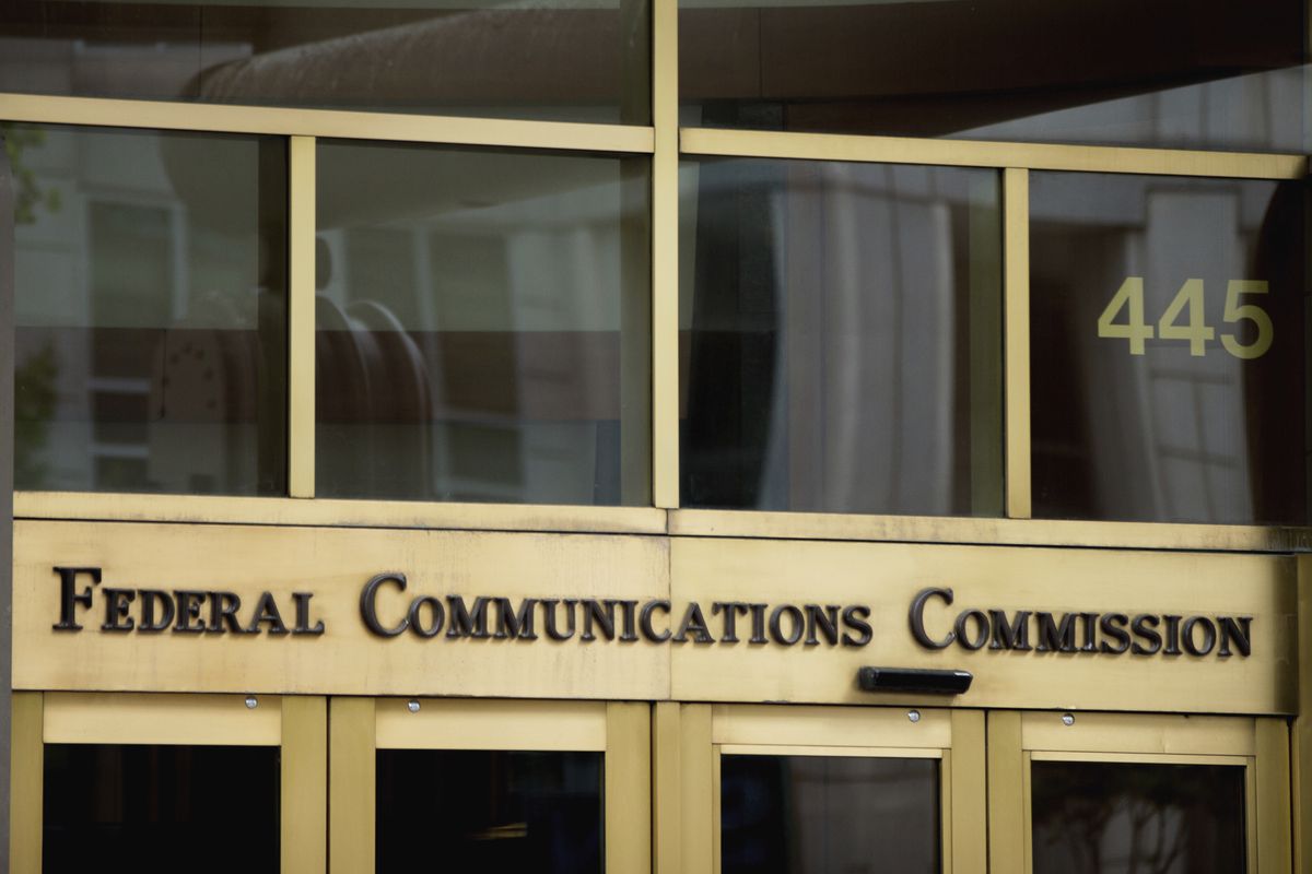 FILE - This June 19, 2015, file photo, shows the entrance to the Federal Communications Commission (FCC) building in Washington. "Net neutrality" regulations, designed to prevent internet service providers like Verizon, AT&T, Comcast and Charter from favo