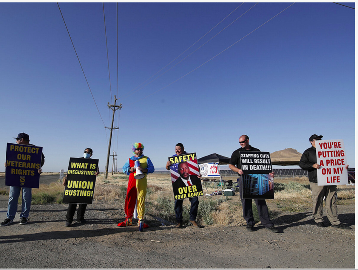 Corrections officers protest working conditions and staff shortages outside the Federal Correctional Institution in Mendota, Calif., in May.