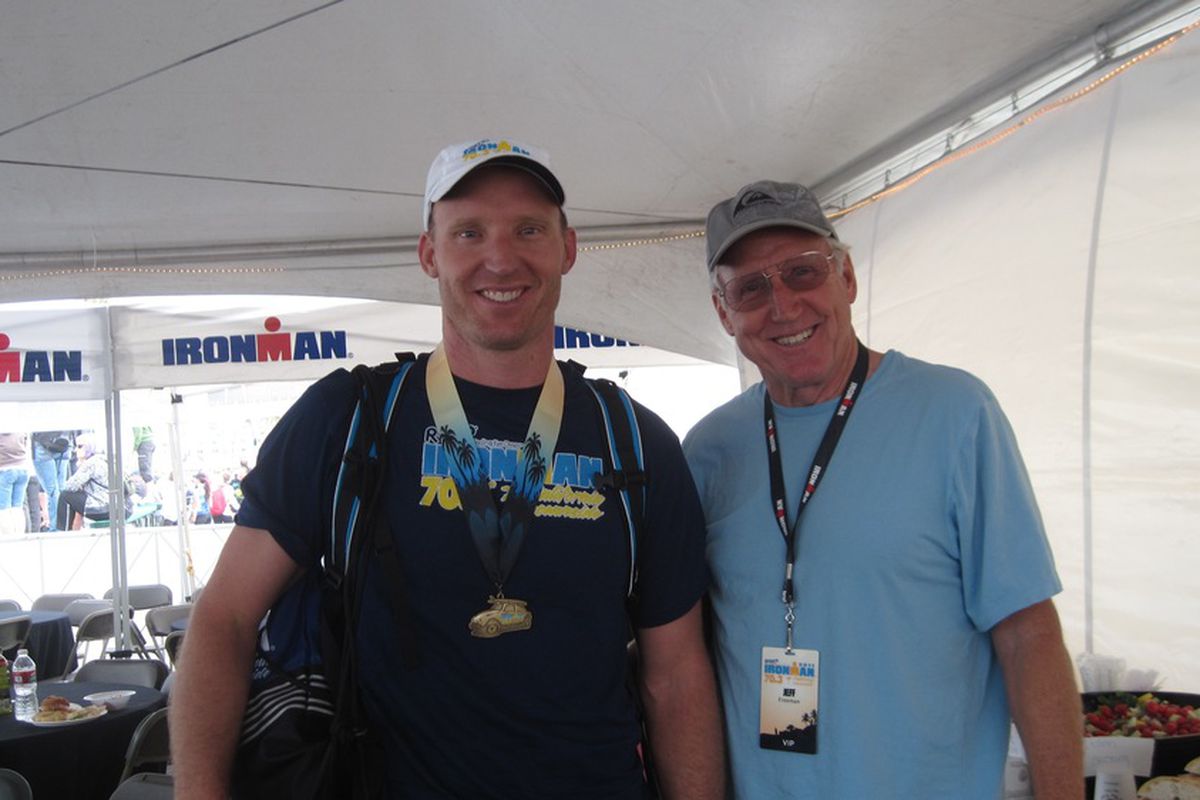 Mike Freeman, left with dad, Jeff Freeman, after a triathlon.
