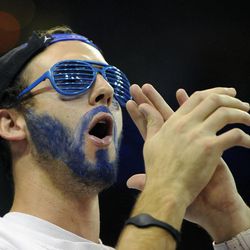 A Brigham Young Cougars fan cheers during a game at EnergySolutions Arena on Saturday, November 30, 2013.
