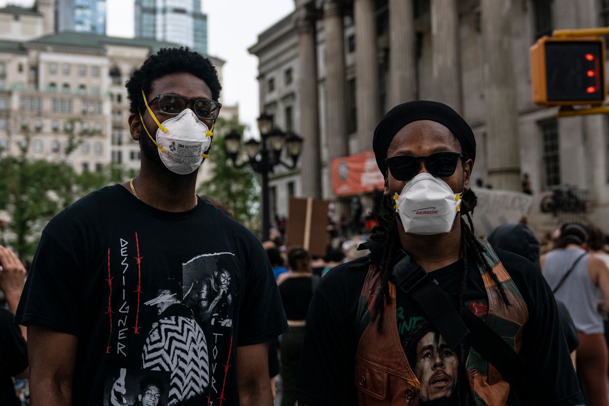 “The numbers don’t lie, for almost every metric that assesses quality of life you’ll see black people below white people,” said healthcare worker, EZ, left,  who was protesting with friend Ron in Brooklyn, June 5, 2020. “That’s why we are out here getting involved and having our voices heard.”