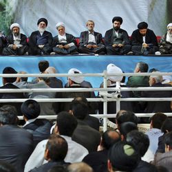 In this photo released by an official website of the Iranian Supreme Leader's office, late Ayatollah Khomeini's grandson Hassan, top from left, President Mahmoud Ahmadinejad, judiciary chief Sadeq Larijani, former judiciary chief Mahmoud Hashemi Shahroudi, former President Akbar Hashemi Rafsanjani, parliament speaker Ali Larijani, Khomeini's grand sons Yasser and Ali, head of Guardian Council Ahmad Jannati and head of Experts Assembly Mohammad Reza Mahdavi Kani sit in a ceremony commemorating the anniversary of the death of the late revolutionary founder Ayatollah Khomeini at his shrine just outside Tehran, Iran, Tuesday, June 4, 2013. Iran's Supreme Leader Ayatollah Ali Khamenei, who delivered a speech during the ceremony, urged presidential candidates on Tuesday not to make concessions to appease the West, an implied rebuke to several of the candidates running in June 14 elections who said that they would focus on improving the Islamic Republic's relations with other countries. 