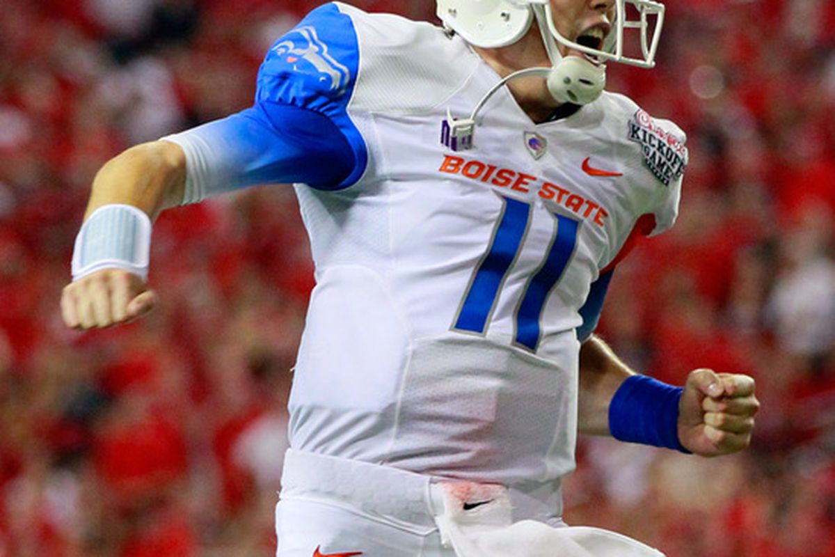 ATLANTA, GA - SEPTEMBER 03:  Kellen Moore #11 of the Boise State Broncos reacts after a touchdown against the Georgia Bulldogs at Georgia Dome on September 3, 2011 in Atlanta, Georgia.  (Photo by Kevin C. Cox/Getty Images)