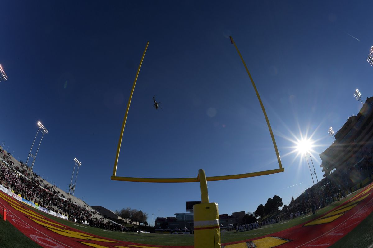 General overall view of a helicopter flyover through the goal posts in the second half during the New Mexico Bowl between the Central Michigan Chippewas and the San Diego State Aztecs at Dreamstyle Stadium.