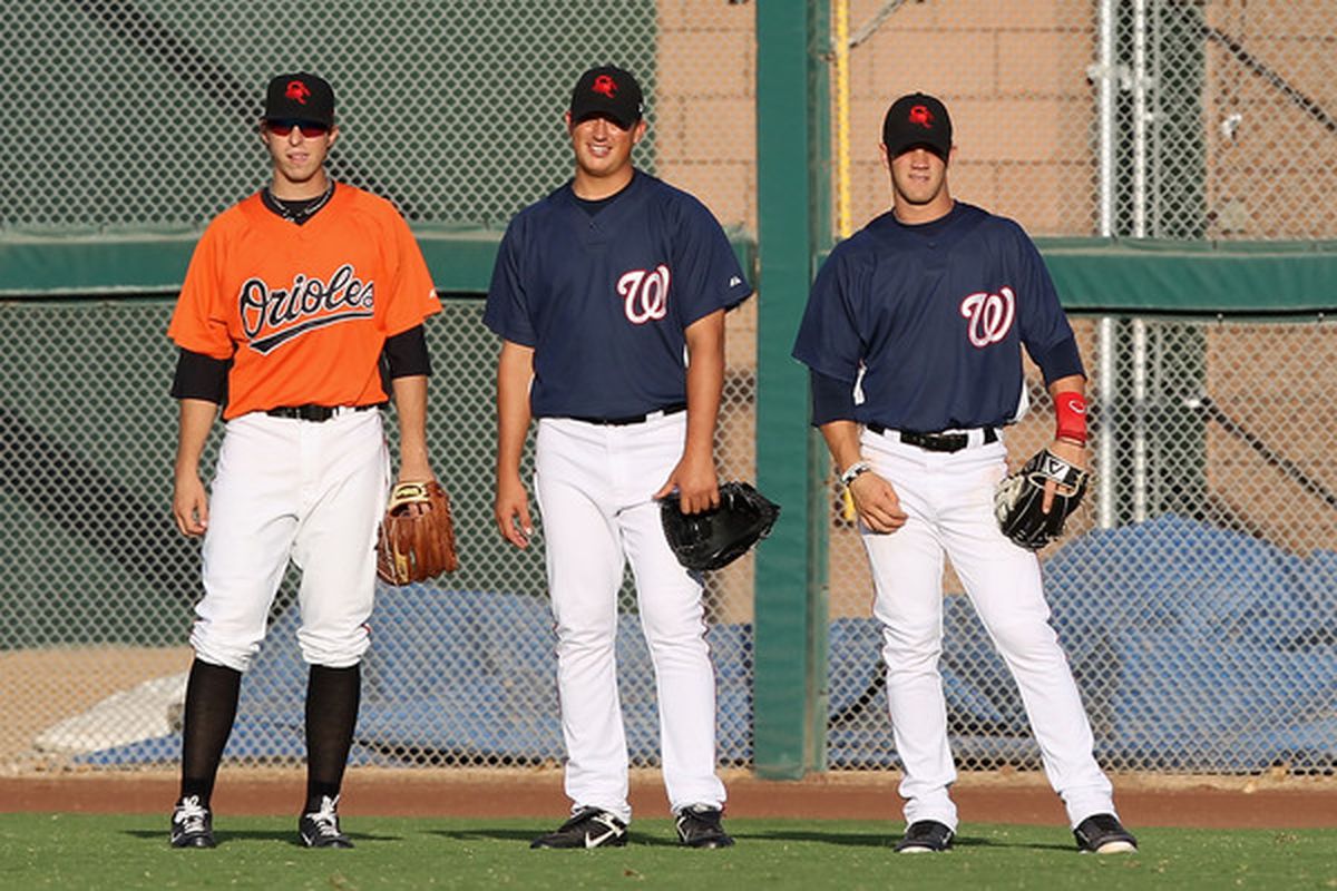 (L-R) Sammy Solis #51 and Washington Nationals prospect Bryce Harper are playing for the Scottsdale Scorpions this afternoon when they take on the Surprise Rafters. (Photo by Christian Petersen/Getty Images)