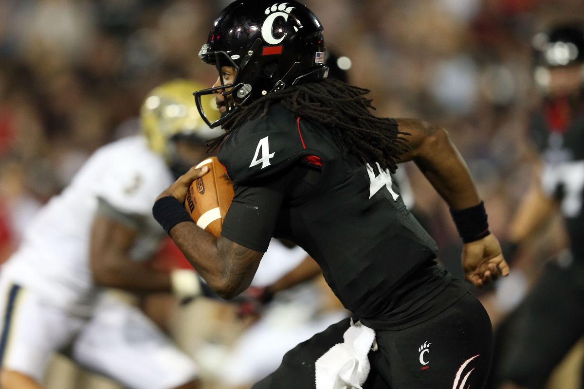 CINCINNATI, OH - SEPTEMBER 06:  Munchie Legaux #4 of the Cincinnati Bearcats runs with the ball during the game against the Pittsburgh Panthers at Nippert Stadium on September 6, 2012 in Cincinnati, Ohio.  (Photo by Andy Lyons/Getty Images)