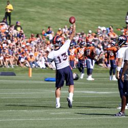 Broncos QB Trevor Siemian throws deep during drills on the first day of Training Camp.