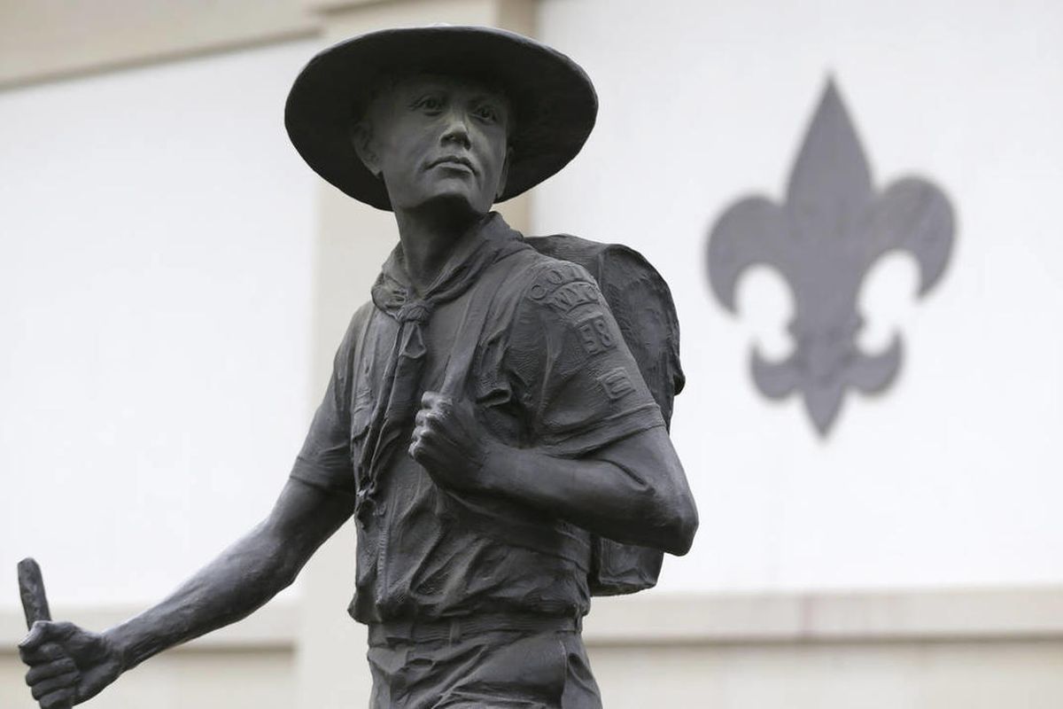 A statue of a Boy Scout stands in front of the National Scouting Museum, Monday, Jan. 28, 2013, in Irving, Texas. The Boy Scouts of America announced it is considering a change to its policy of excluding gays as leaders and youth members.