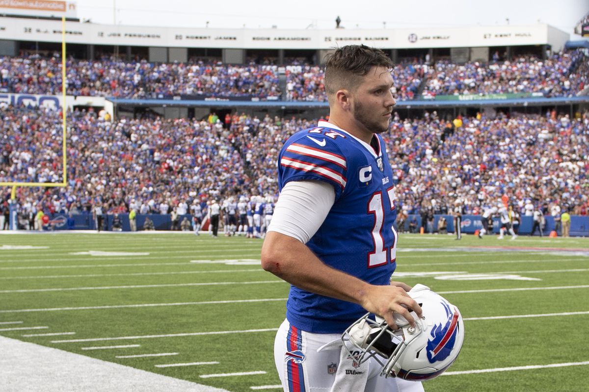 Buffalo Bills quarterback Josh Allen exits the field after being injured during the third quarter against the New England Patriots at New Era Field.
