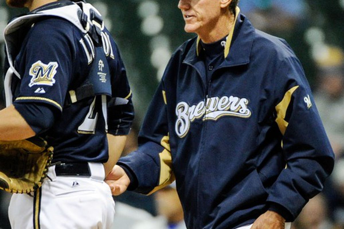 Apr 19, 2012; Milwaukee, WI, USA;   Milwaukee Brewers manager Ron Roenicke visits the mound during game against the Los Angeles Dodgers at Miller Park.   The Dodgers beat the Brewers 4-3. Mandatory Credit: Benny Sieu-US PRESSWIRE
